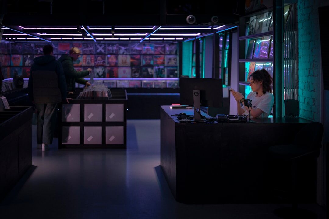 Journalist working at a modern newsroom computer